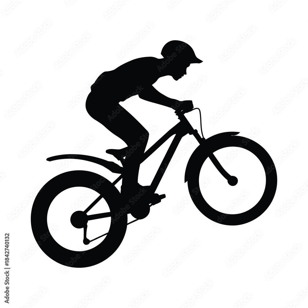 Obraz premium Man riding bicycle silhouette