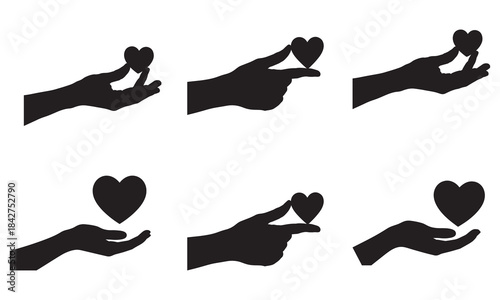 Set of six black silhouettes of hands holding small hearts