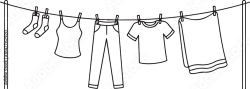 Minimalist black and white line of clothes hanging on a drying line minimalist socks