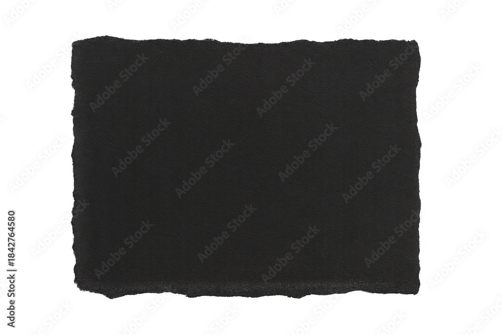 Obraz premium Black torn paper piece with distressed edges creating a rugged texture and empty copy space on a transparent background