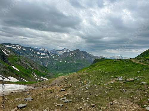 high mountain landscape of the Col du Bonhomme on a cloudy July Day 