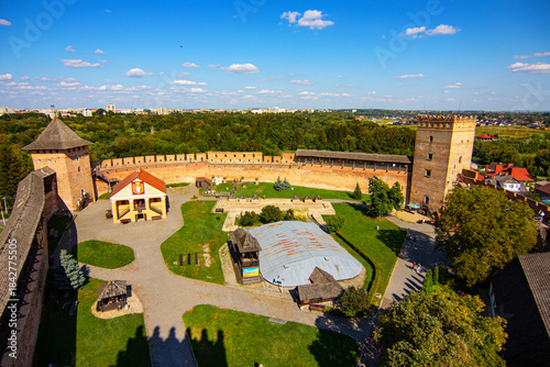 Top view of Vladychya Tower on the lefr, small building of book museum in the center and Styrova Tower on the right, Lutsk (Lubart) Castle in Ukraine