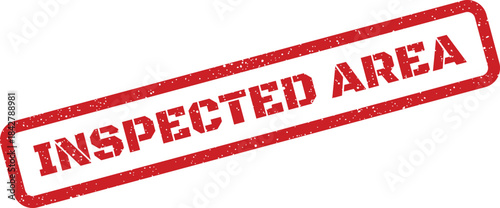 A bold red grunge rubber stamp impression displaying INSPECTED AREA, indicating a specific location has been checked