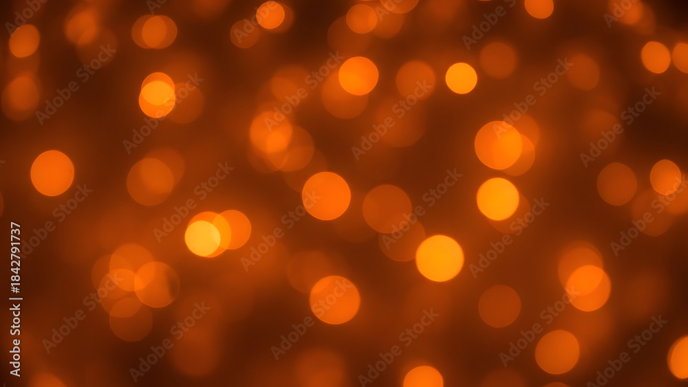 Obraz premium Warm Orange Bokeh Background with Soft, Defocused Circular Lights