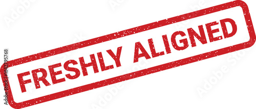 A red rectangular rubber stamp mark with a gritty, worn texture displays the phrase FRESHLY ALIGNED in bold uppercase