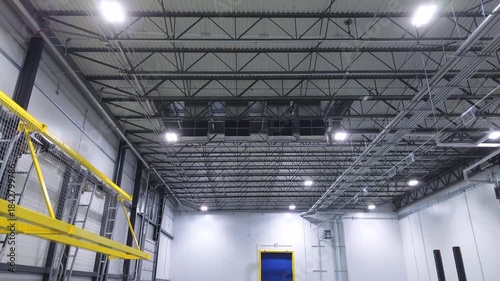 Air conditioning fan vents mounted on steel ceiling of cold storage warehouse	
