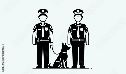 Two police officers standing with a police dog