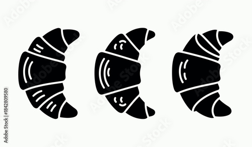 Black croissant illustrations in a row on white background