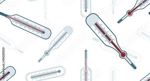 Assorted thermometers and temperature instruments scattered on a clean light background illustrating medical measurement tools used in healthcare.