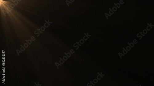 Loop corner glow gold light optical lens flares shine animated on black background. Warm shine light rays looping 4k video. Luminous star motion
