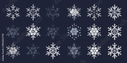 An assortment of detailed realistic snowflake patterns on a dark navy background