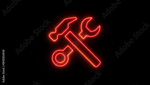Red Neon Tools Icon on Black Background photo