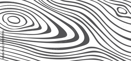 A black and white image of a wood grain pattern