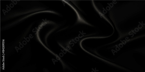 Luxurious black satin and silk fabric background with smooth flowing waves and a soft light texture creating a liquid blue design backdrop for an elegant textile pattern