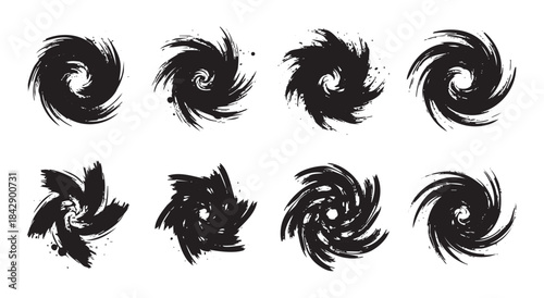 Abstract grunge spiral shapes collection featuring eight distinct black ink brushstroke vortex designs with a dynamic, textured appearance.