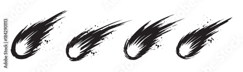 Four dynamic brushstroke comets with ink splatters create a grunge artistic design element, perfect for adding a touch of edgy style to any creative project.