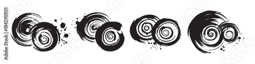 Abstract black brushstroke spirals with artistic ink splatters creating dynamic graphic elements for a creative and modern design concept.