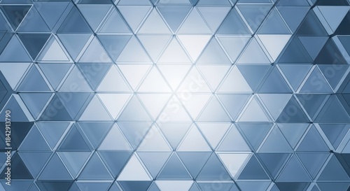 Abstract blue triangular pattern background with a central light source