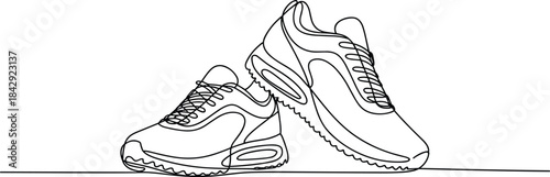 Minimal continuous line drawing of modern sneakers showcasing stylish athletic footwear design, ideal for fashion illustrations, sports branding, shoe advertisements, and contemporary graphic artwork.