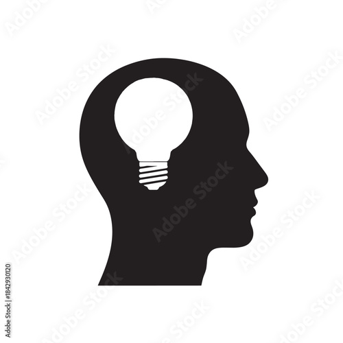 Black Silhouette of Human Head with Light Bulb Inside