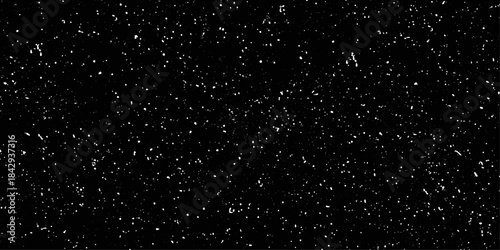 Snowstorm texture. Falling snow on black background. 