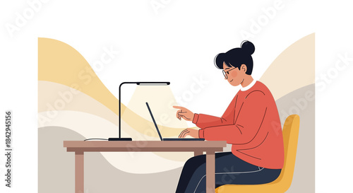 Focused student studying with laptop and lamp in cozy workspace environment at home