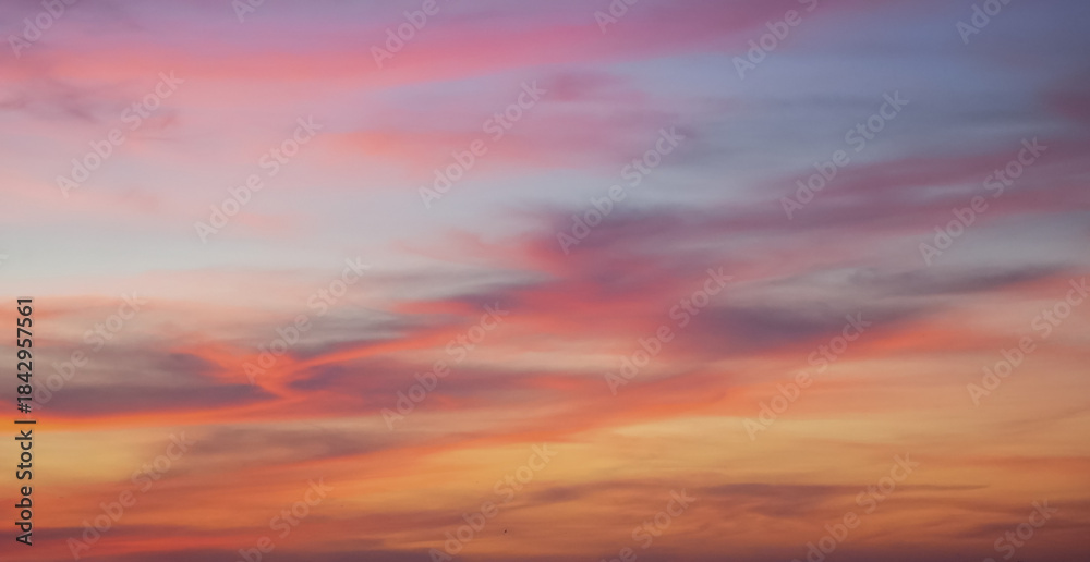 Fototapeta premium Beautiful sunset sky with colorful clouds glowing in the evening light