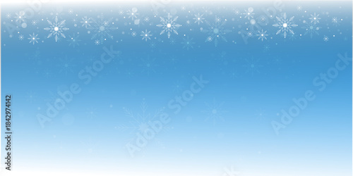 blue winter background with snowflakes