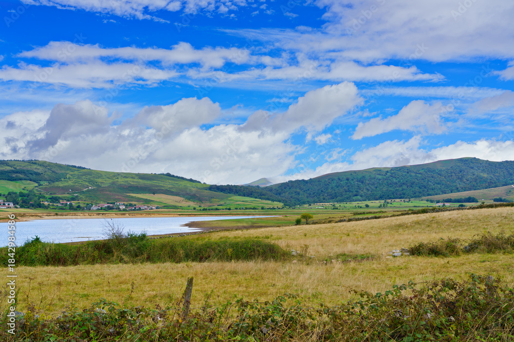 Obraz premium Ebro reservoir water and green hills landscape