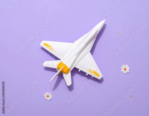 Dreaming of Flight: A Toy Airplane Against a Soft Purple Sky with Daisy Flowers