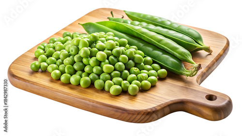 Fresh green peas and pods on a wooden cutting board against a transparent background