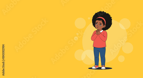 Young girl with a large afro stands with hands held near her chin on a vivid yellow background as she looks thoughtfully at something ahead.
