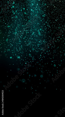 A dark background with numerous small bright blue dots scattered throughout