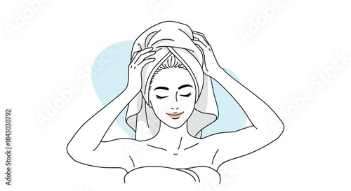 Relaxing beauty routine as a calm woman wraps a towel around her head and enjoys a tranquil home spa moment with a peaceful smile.