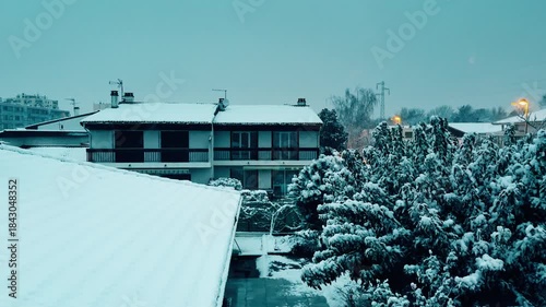 Snow-covered residential buildings during winter in Grenoble