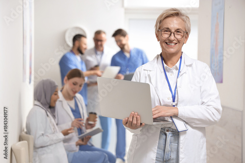 Female doctor working with ...