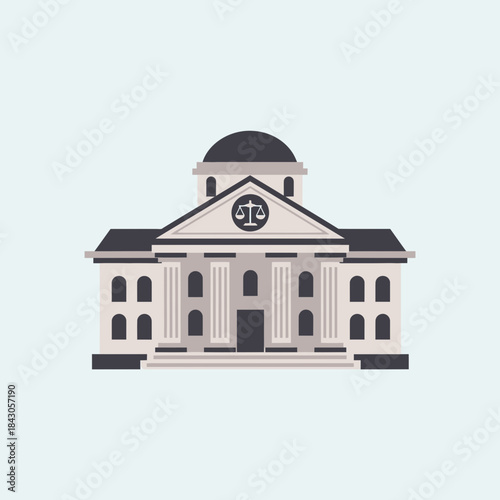 Building with columns and a scales of justice symbol on the facade.