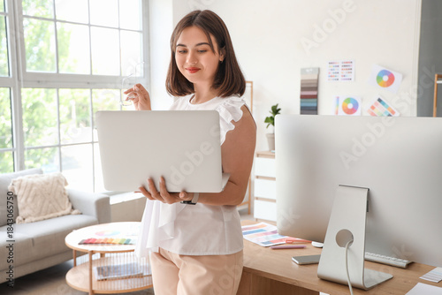 Young female interior desig...