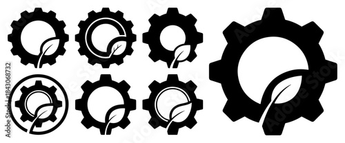 Set of industrial gear icons with leaves representing eco friendly technology