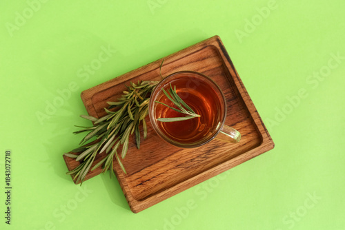 Wooden board with glass cup...