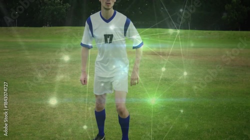 Soccer player reacting to incoming ball doing bicycle kick to strike and sliding green overlay maps