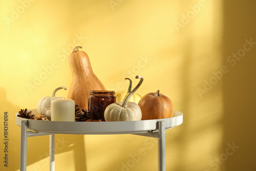 Burning candles, pumpkins, ...