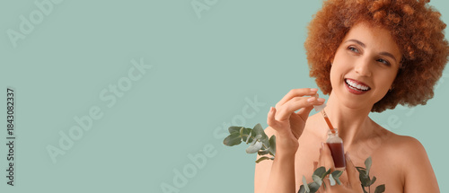 Young redhead woman with na...