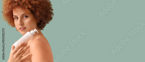 Young redhead woman with bo...