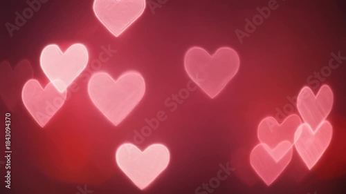 Heart-shaped bokeh lights create a romantic and dreamy red background, perfect for love concepts and special occasions.