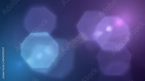 Abstract background of glowing hexagonal bokeh light flares in blue and purple gradient colors, creating a vibrant and atmospheric effect.