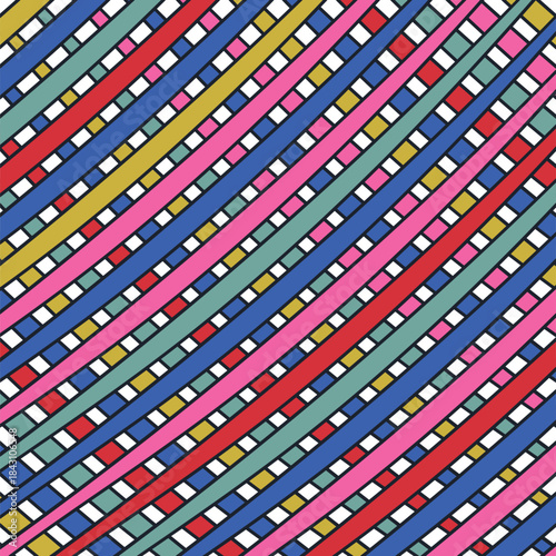 Rainbow stripes or ribbons intersect to form a festive wall.