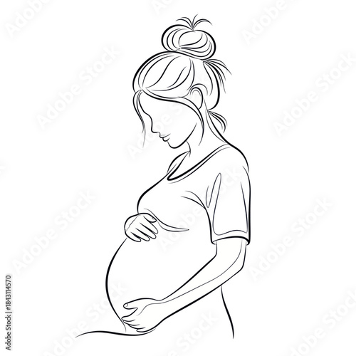 Pregnant woman gently cradling her baby bump in a serene moment.