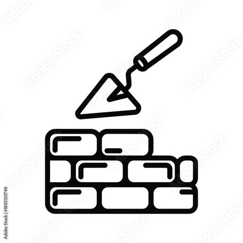 Black line icon showing a construction trowel laying mortar on a partially built brick wall section