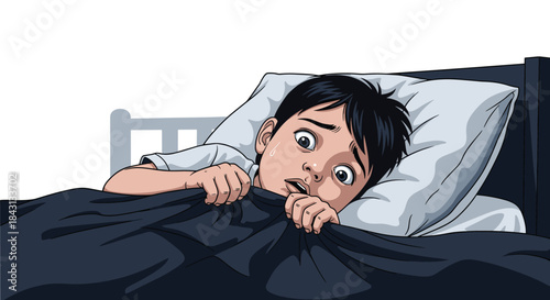 Terrified young boy hiding under the covers in his bed at night, suffering from a nightmare, fear, or anxiety attack.